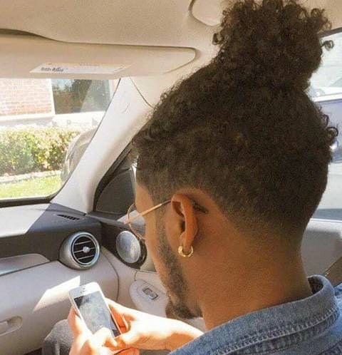 Curly-Hair-Man-Bun - Mens Hairstyle 2020