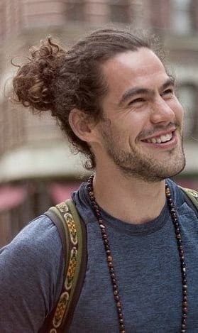 Curly-Man-Bun-1 - Mens Hairstyle 2020